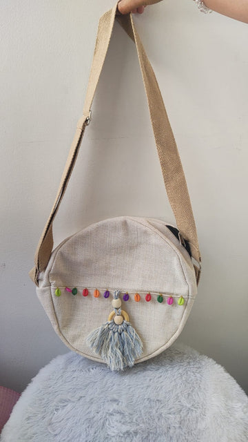 Handcrafted Off-White Round Jute Sling Bag with Tassel & Multicolor Bead Detailing – Eco-Friendly Crossbody Bag